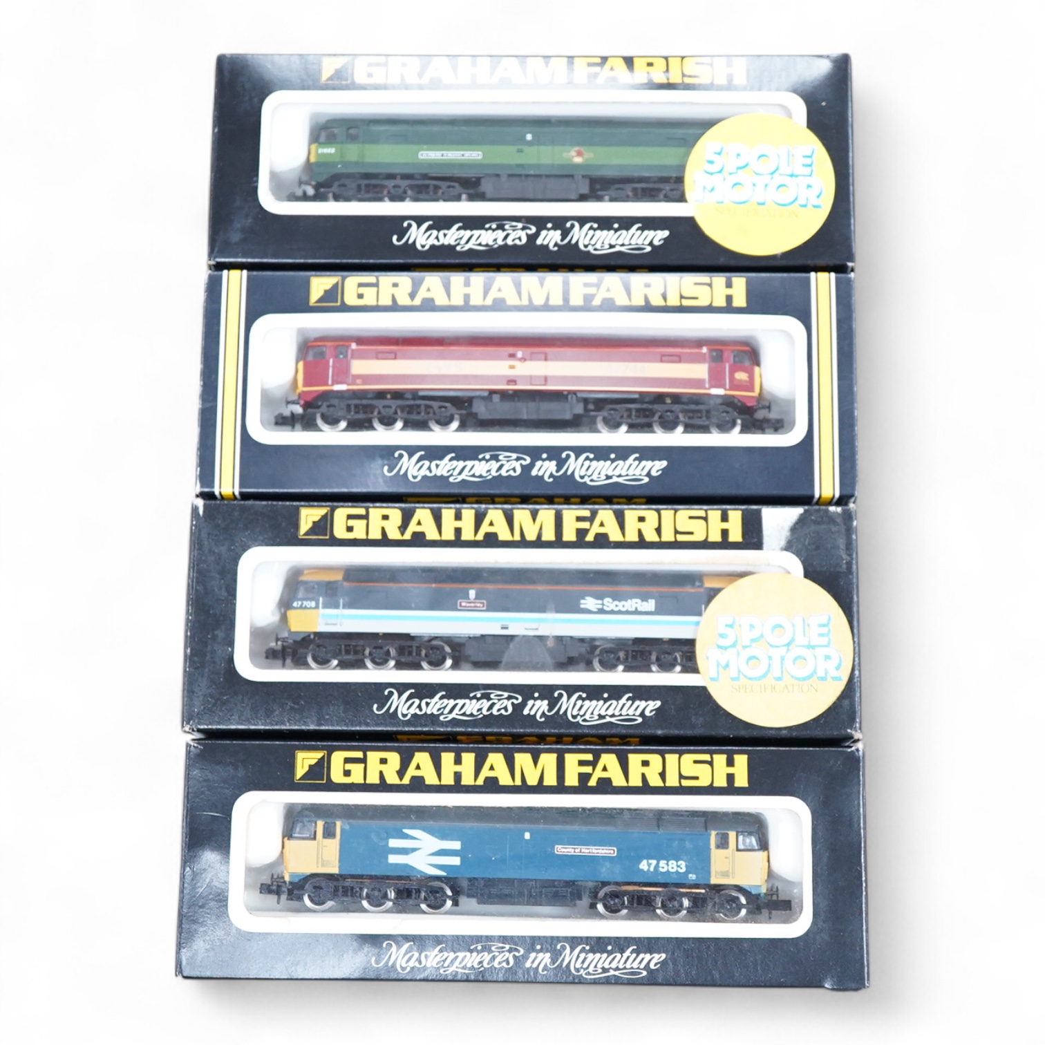 Four boxed Graham Farish N gauge railway Class 47 diesel locomotives; a BR, County of Hertfordshire 47 583 (8007), a BR, Isambard Kingdom Brunel D1662 (8004), an EWS, 47744, (802C) and a ScotRail, Waverley 47708 (8001).